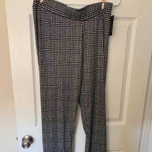 Black pants with white stripes